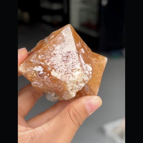 Large translucent orange scheelite crystal from Xuebaoding, Sichuan — alternate view