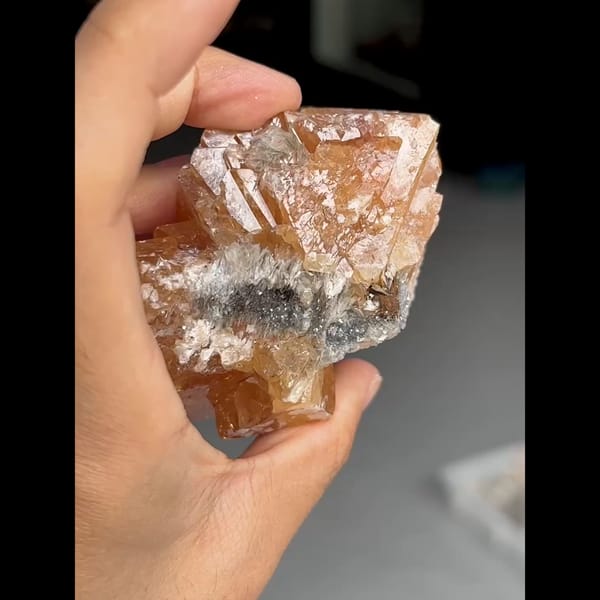 Large translucent orange scheelite crystal from Xuebaoding, Sichuan — detail view