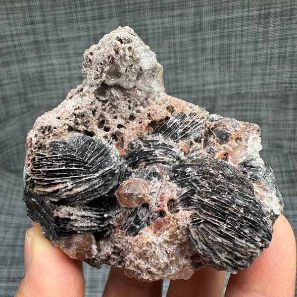 Frosted specular hematite rosettes with quartz on reddish matrix — alternate view