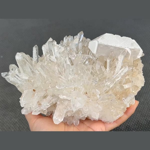 White tabular barite on a clear quartz cluster from Jinkouhe, Sichuan — complete view