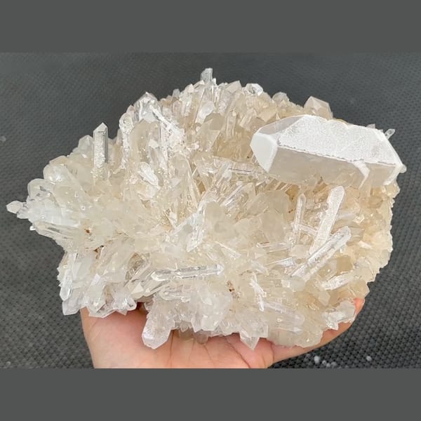 White tabular barite on a clear quartz cluster from Jinkouhe, Sichuan — alternate view