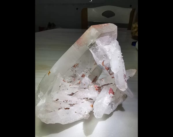 Complete front view of the exact Madagascar red-tipped quartz cluster