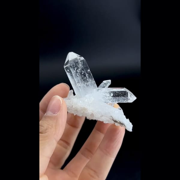 Sculptural cluster of clear quartz points from Jinkouhe, Sichuan — complete view