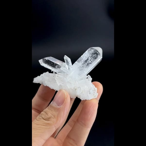Sculptural cluster of clear quartz points from Jinkouhe, Sichuan — alternate view