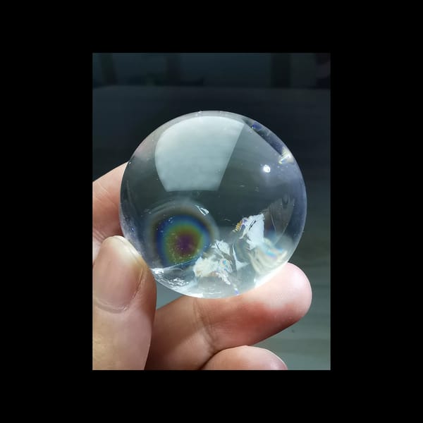 Rainbow clear quartz sphere, 38.5 mm — detail view