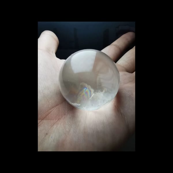 Rainbow clear quartz sphere, 38.5 mm — detail view