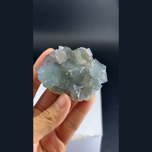 Soft blue cubic fluorite cluster from Tanghekou, Beijing — alternate view