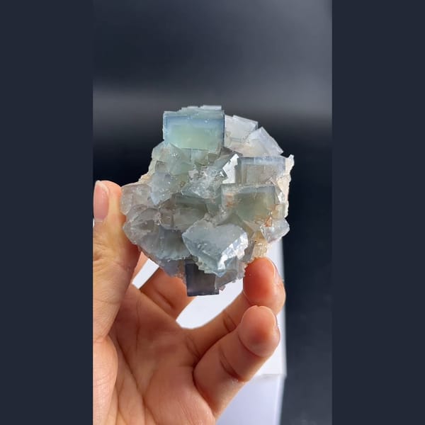 Soft blue cubic fluorite cluster from Tanghekou, Beijing — alternate view