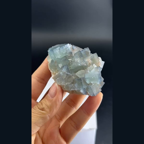 Soft blue cubic fluorite cluster from Tanghekou, Beijing — detail view