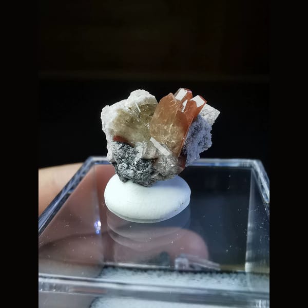 Wine-red topaz crystals on matrix from Mexico — alternate view