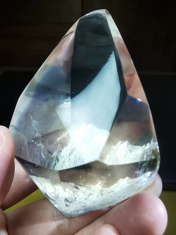Complete angled view of the same transparent quartz freeform