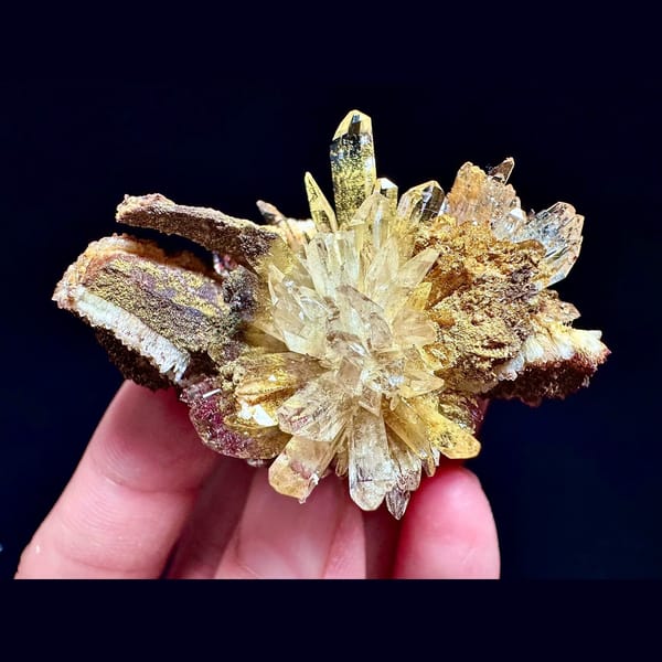 Radiating creedite flower on matrix from Guizhou — complete view