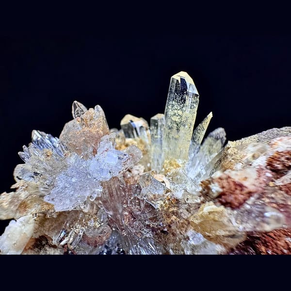 Radiating creedite flower on matrix from Guizhou — detail view
