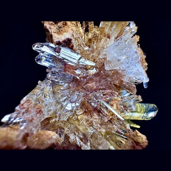 Radiating creedite flower on matrix from Guizhou — detail view