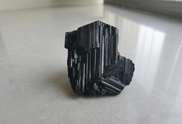 Black Tourmaline Crystal with Stepped Faces — individual mineral specimen view 1