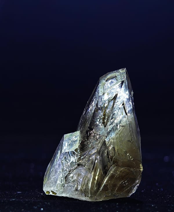 Smoky skeletal quartz with enhydro inclusion from Namibia, full crystal and natural base in third view