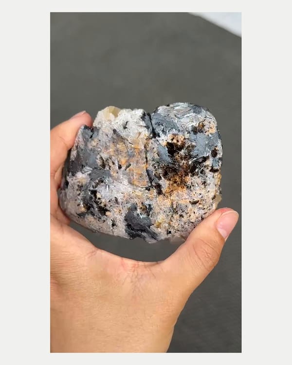 Complete underside view of specular hematite with quartz
