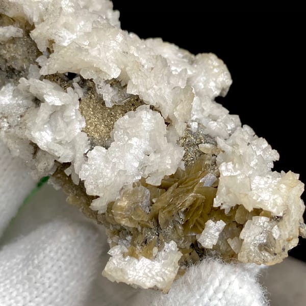 White dolomite crystals with golden-brown siderite — complete view