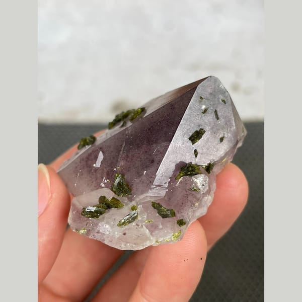 Lilac-tinted quartz with dark green epidote from Sichuan — alternate view