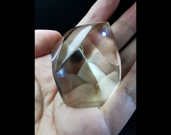 Complete front view of the exact pale smoky quartz freeform