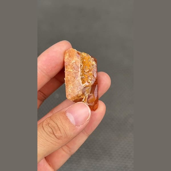 Gemmy orange scheelite crystal from Xuebaoding, Sichuan — alternate view