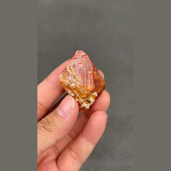 Gemmy orange scheelite crystal from Xuebaoding, Sichuan — alternate view