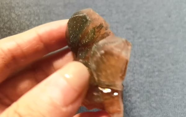 Complete underside view of the exact Chocolate-Brown Calcite with Pyrite from Daye