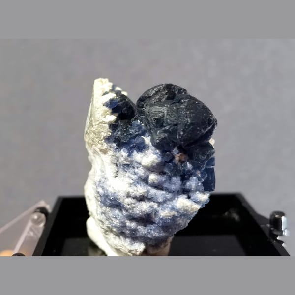 Deep blue blueberry fluorite on white matrix from Inner Mongolia — complete view