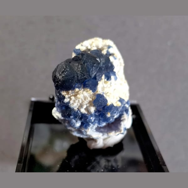 Deep blue blueberry fluorite on white matrix from Inner Mongolia — alternate view