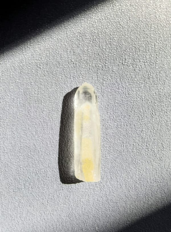 Slim Himalayan Phantom Quartz Point — Pakistan — individual mineral specimen view 2