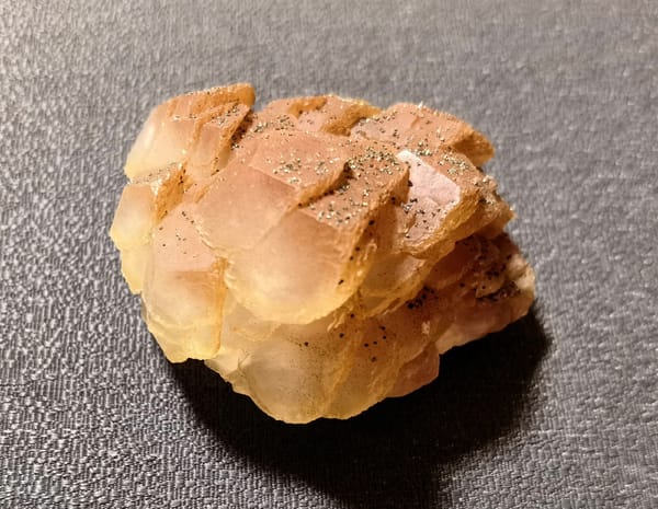 Coin-Stack Calcite Tower with Pyrite — Daye — individual mineral specimen view 2