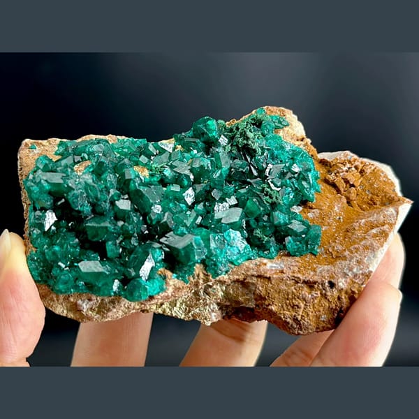 Emerald-green dioptase crystals on matrix from Congo — alternate view