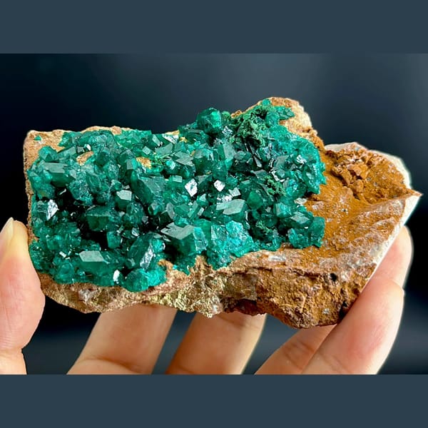 Emerald-green dioptase crystals on matrix from Congo — alternate view