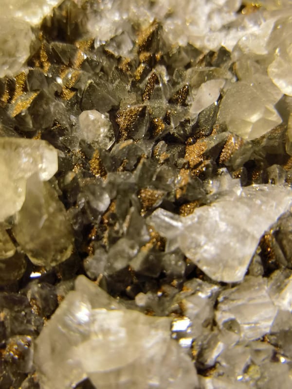 Diamond Calcite with Iridescent Pyrite — individual mineral specimen view 1