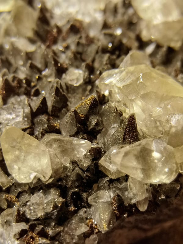 Diamond Calcite with Iridescent Pyrite — individual mineral specimen view 2
