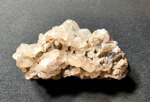 Diamond Calcite with Red Mineral Matrix — Daye — individual mineral specimen view 2