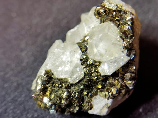 White Calcite with Iridescent Pyrite — Daye — individual mineral specimen view 1