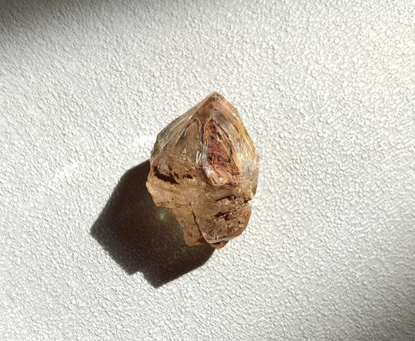 Red-Clay Skeletal Quartz with Clear Window — Madagascar — individual mineral specimen view 1