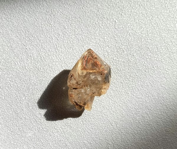 Red-Clay Skeletal Quartz with Clear Window — Madagascar — individual mineral specimen view 2