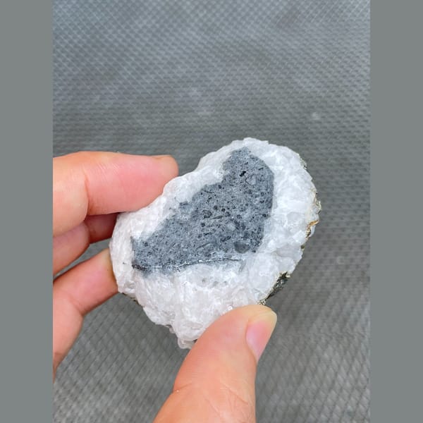 Calcite with brassy pyrite from Hubei — alternate view