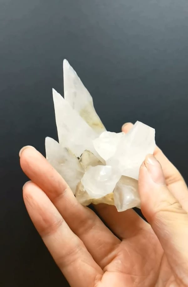 Complete underside view of the exact White Dogtooth Calcite Cluster from Hunan