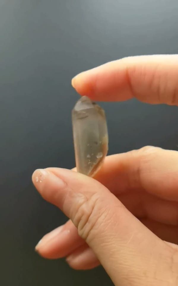 Complete side view of the exact Green Phantom Quartz with Red Needle Inclusions