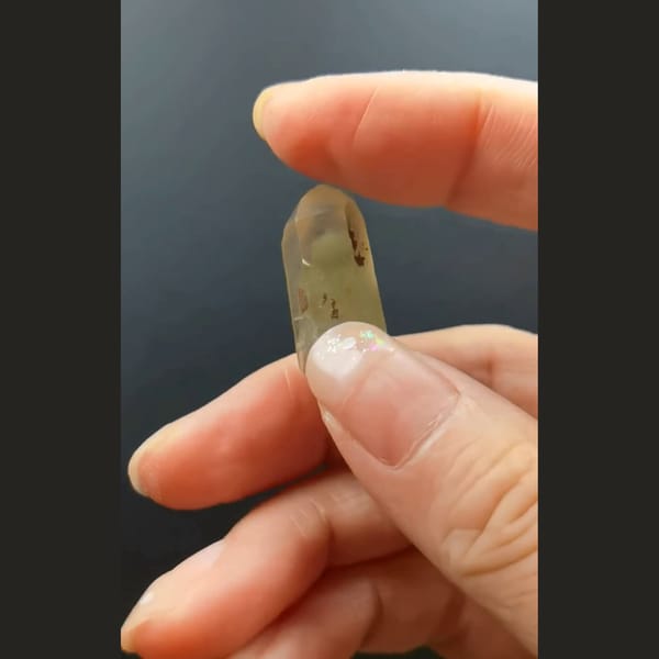 Pale green phantom quartz point from Madagascar — alternate view