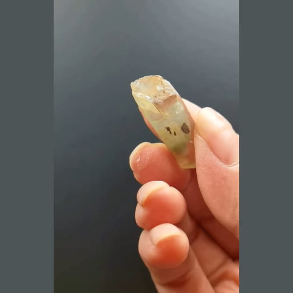 Pale green phantom quartz point from Madagascar — detail view