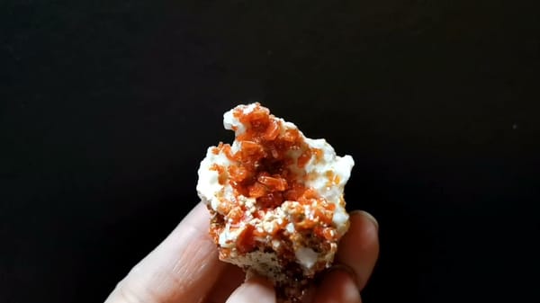Complete front view of Vanadinite on Barite from Morocco