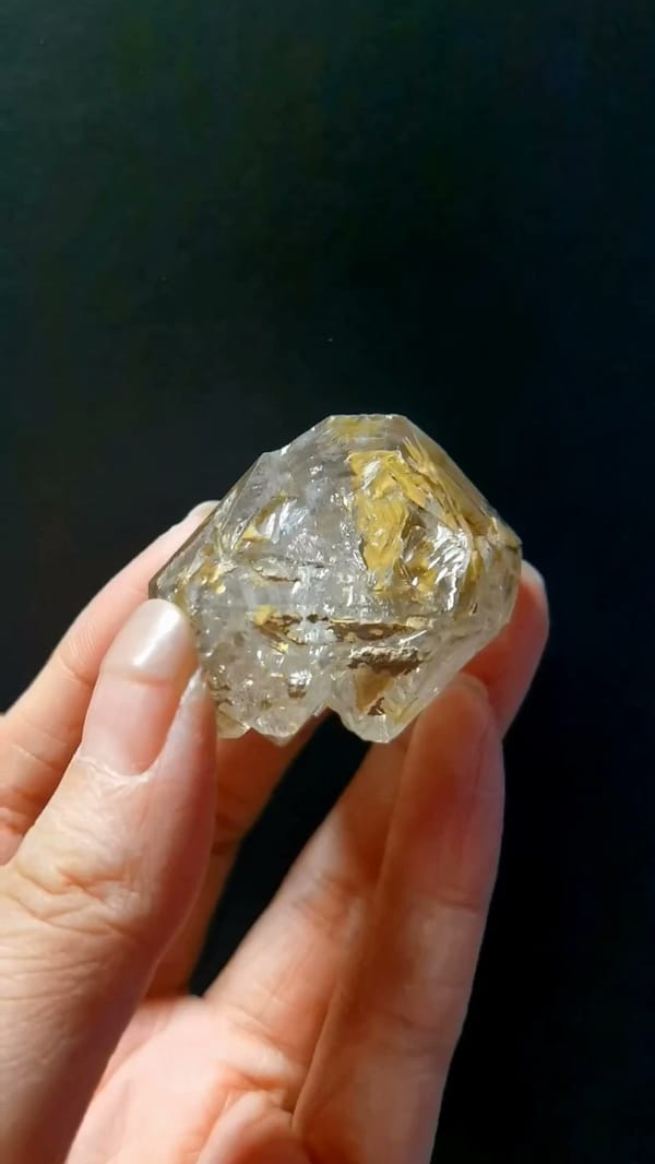 Complete front view of Golden Skeletal Quartz with Rainbow from Pakistan