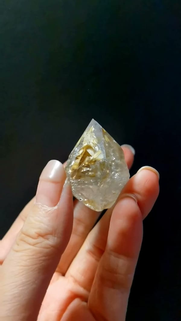 Complete side view of the exact Golden Skeletal Quartz with Rainbow from Pakistan
