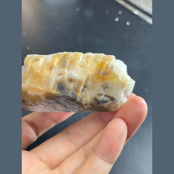 Lilac-purple fluorite cubes on white quartz from Guizhou — detail view