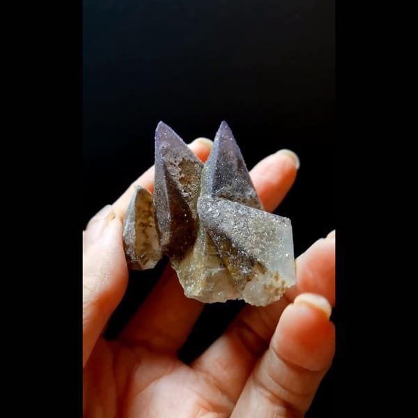 Pyramidal fluorite with dogtooth calcite from Guizhou — detail view