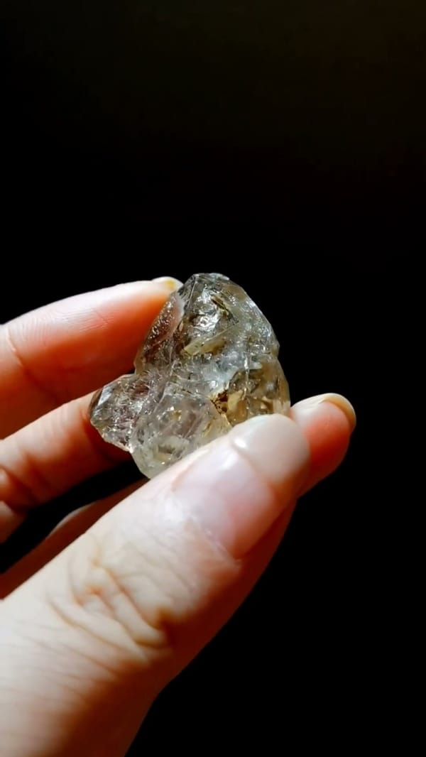 Complete side view of the exact Small Earth-Toned Skeletal Quartz from Pakistan